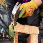 Woodwork boy hammering